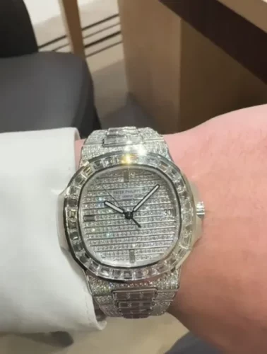 Patek Philippe Nautilus 5719/10G-010 40mm Men's Silver-tone photo review