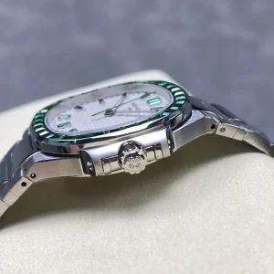 AAAAA Replica Patek Philippe Nautilus 5711 White Dial Green Gemstone Bezel 40mm Automatic Stainless Steel Luxury Watch Side View 2