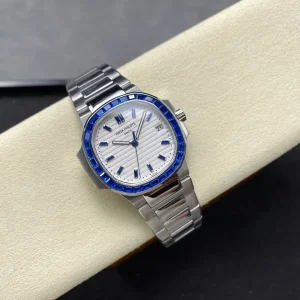 Luxury Patek Philippe Nautilus 5711 Replica 40mm White Embossed Dial Blue Sapphire Bezel Stainless Steel Case Watch Side Profile Of The Dial 1