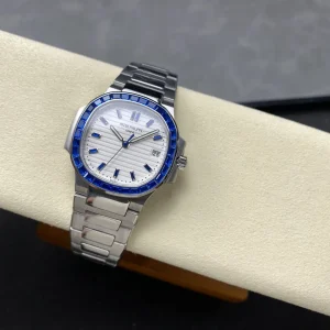 Luxury Patek Philippe Nautilus 5711 Replica 40mm White Embossed Dial Blue Sapphire Bezel Stainless Steel Case Watch Side Profile Of The Dial 2