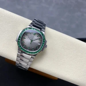 Patek Philippe Nautilus 5711/113P-001 Replica Sunburst Charcoal Dial Baguette Green Gemstone Bezel 40mm Super Clone Watch Side Profile Of The Dial 2