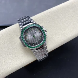 Patek Philippe Nautilus 5711/113P-001 Replica Sunburst Charcoal Dial Baguette Green Gemstone Bezel 40mm Super Clone Watch Side Profile Of The Dial 1