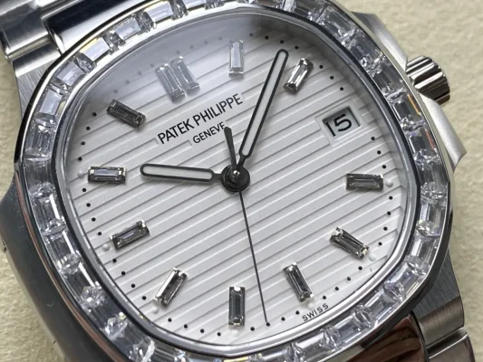 Super Clone Patek Philippe Nautilus 5711/110P-010 Replica 40mm White Embossed Dial Baguette Diamond Markers Diamond Bezel Watch Dial Close-up
