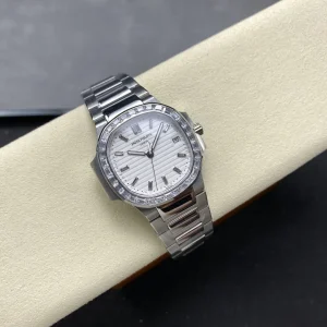 Super Clone Patek Philippe Nautilus 5711/110P-010 Replica 40mm White Embossed Dial Baguette Diamond Markers Diamond Bezel Watch Side Profile Of The Dial 1