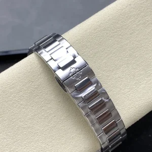 Super Clone Patek Philippe Nautilus 5711/110P-010 Replica 40mm White Embossed Dial Ruby Baguette Bezel Watch Bracelet