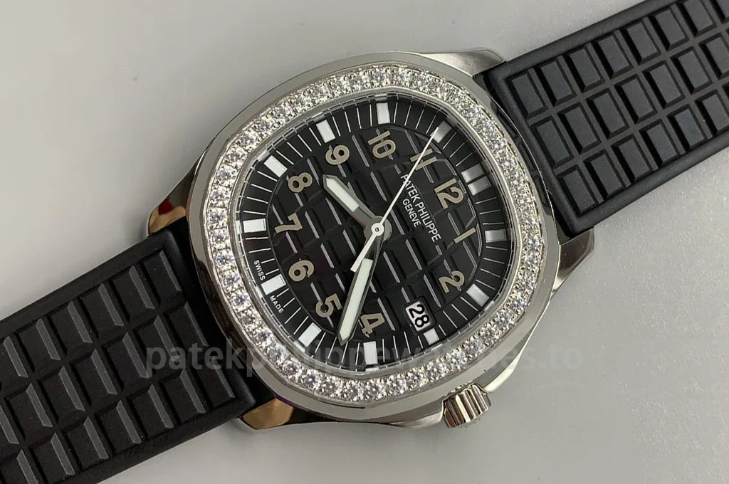 Patek Philippe Aquanaut 5267/200A-001 Super Clone watch with black dial, diamond bezel and black rubber strap close-up view