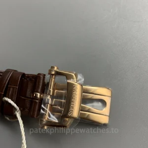 Patek-Philippe-Nautilus-5712R-001-Replica-40mm-Mens-Automatic-Watch-Black-Dial-Rose-Gold-Case-Buckle