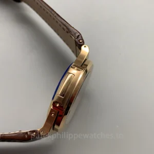 Patek-Philippe-Nautilus-5712R-001-Replica-40mm-Mens-Automatic-Watch-Black-Dial-Rose-Gold-Case-Left-Side