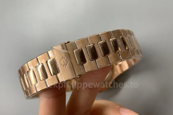 Patek Philippe Nautilus 5980/1R-001 replica men's luxury chronograph watch rose gold bracelet close-up with 904L stainless steel finish