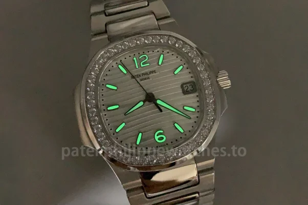 Patek Philippe Nautilus 7010/1G-011 Replica 32mm women's watch with luminous opaline dial and glowing hour markers