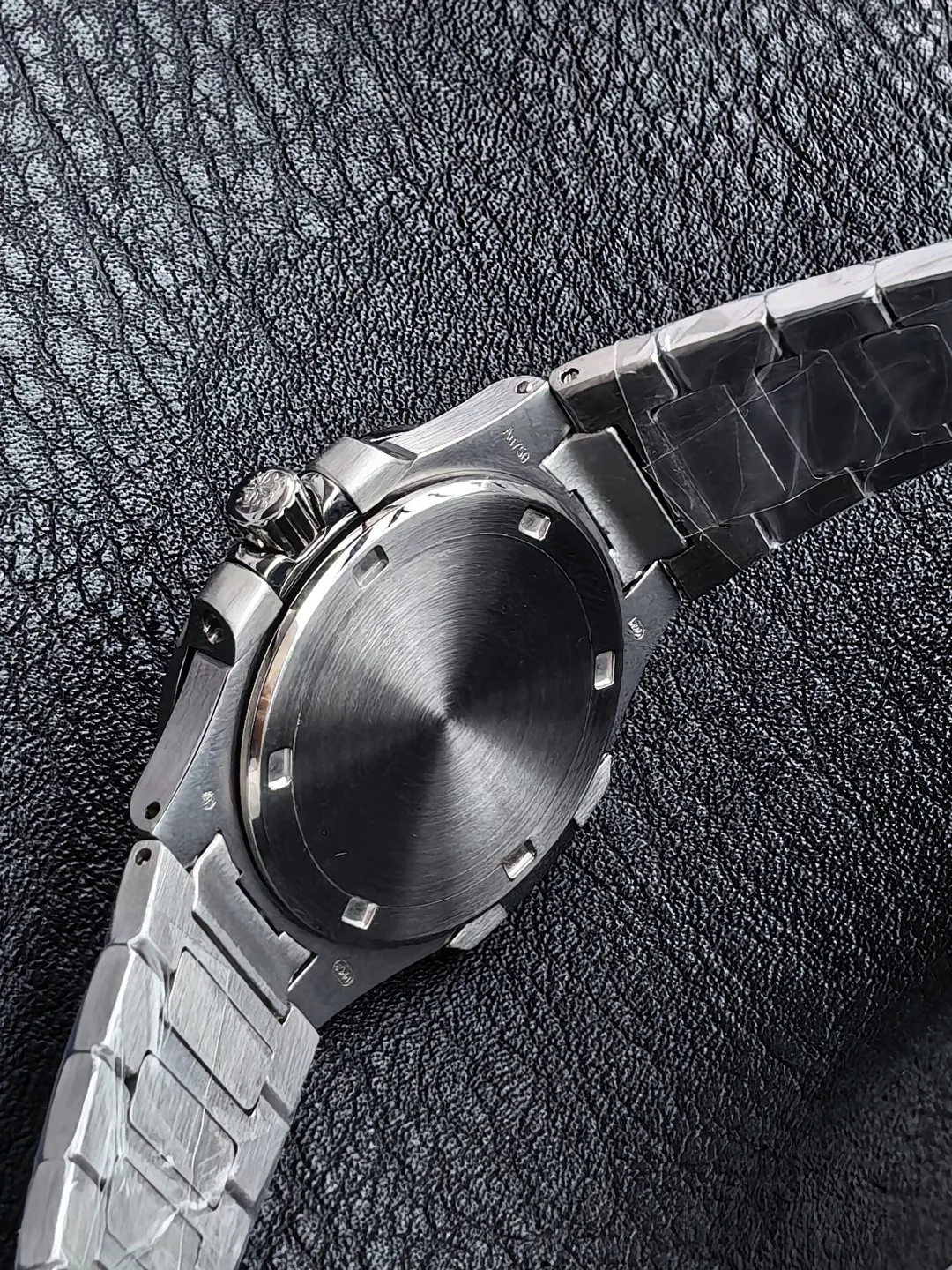 pp-nautilus-7010-1g (5) Patek Philippe Nautilus 7010/1G-013 32mm Super Clone Sky Blue Diamond Bezel Swiss Quartz Movement - Back View
