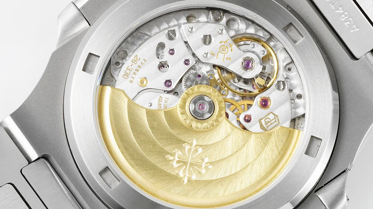 Patek Philippe Nautilus 5711/1A-001 1:1 Clone Cal. 26-330 SC movement with gold rotor and Calatrava cross through sapphire caseback